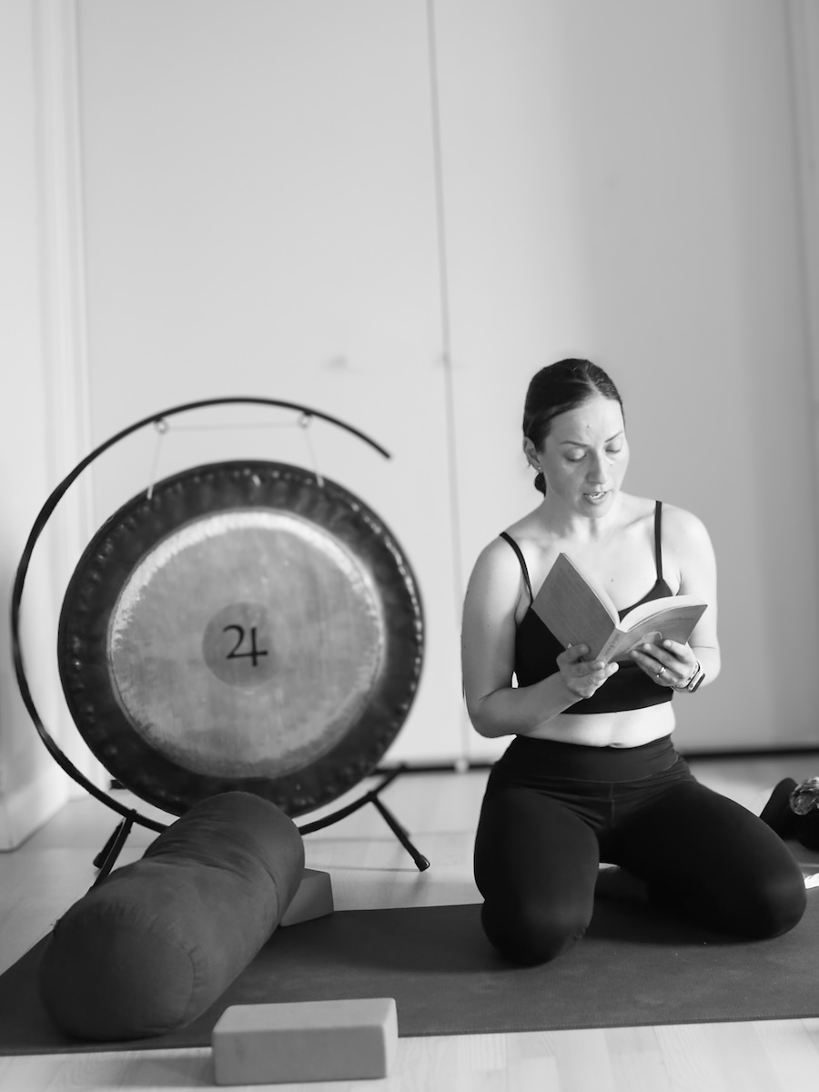student by a gong during the 300 hour course core module 1