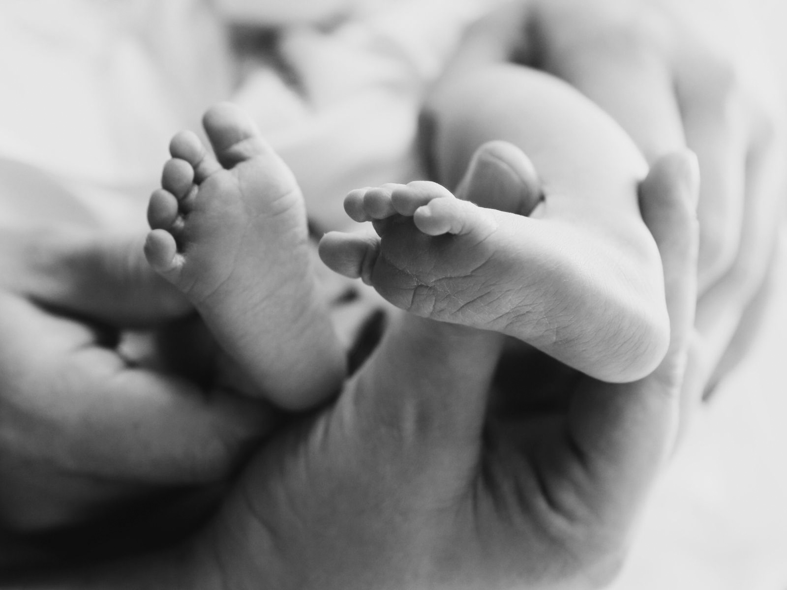 Baby feet during a post-natal teacher training