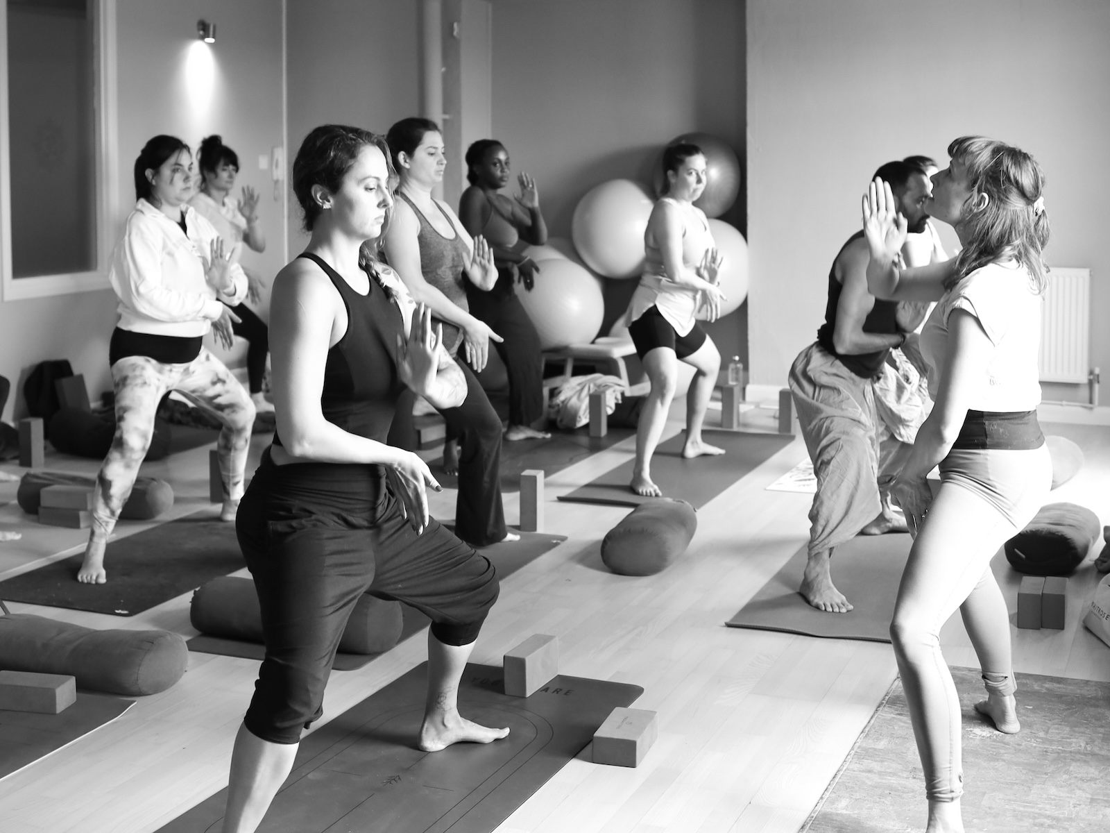 Charli Van Ness Leading a Creative Sequencing contact class at the Shala