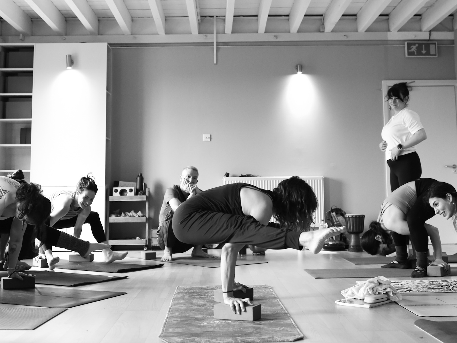 Charli Van Ness demonstrating a peak pose on a Creative Sequencing training