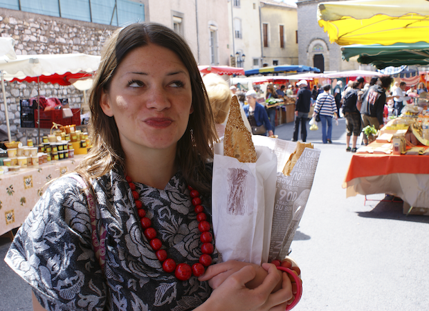 Student shopping in French Market during a yoga reatreat