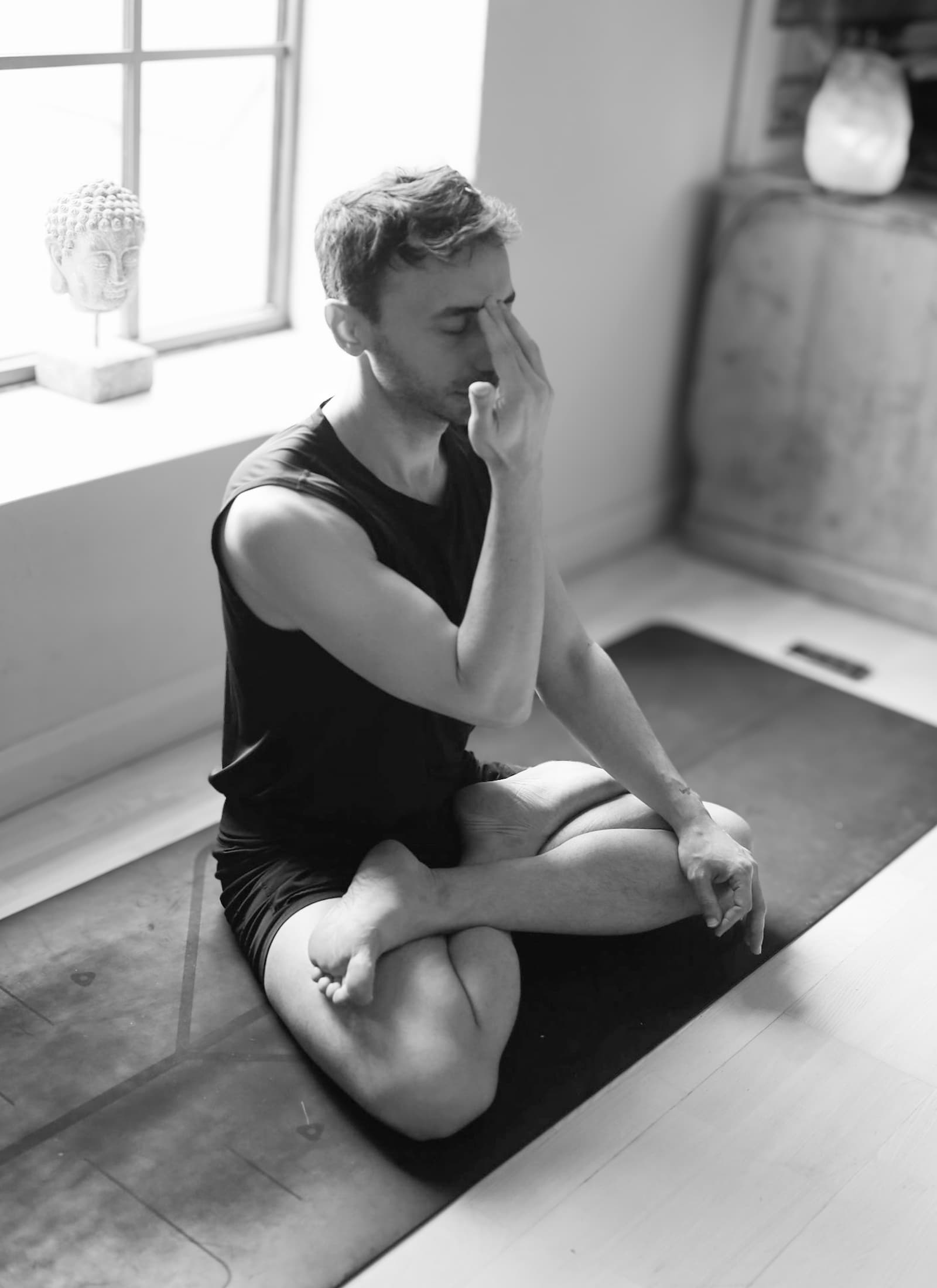 A student practicing breath work during the Pranayama teacher training