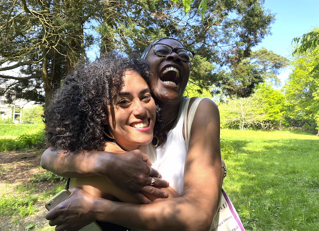 Two students laughing on a Shala yoga retreat in Sussex