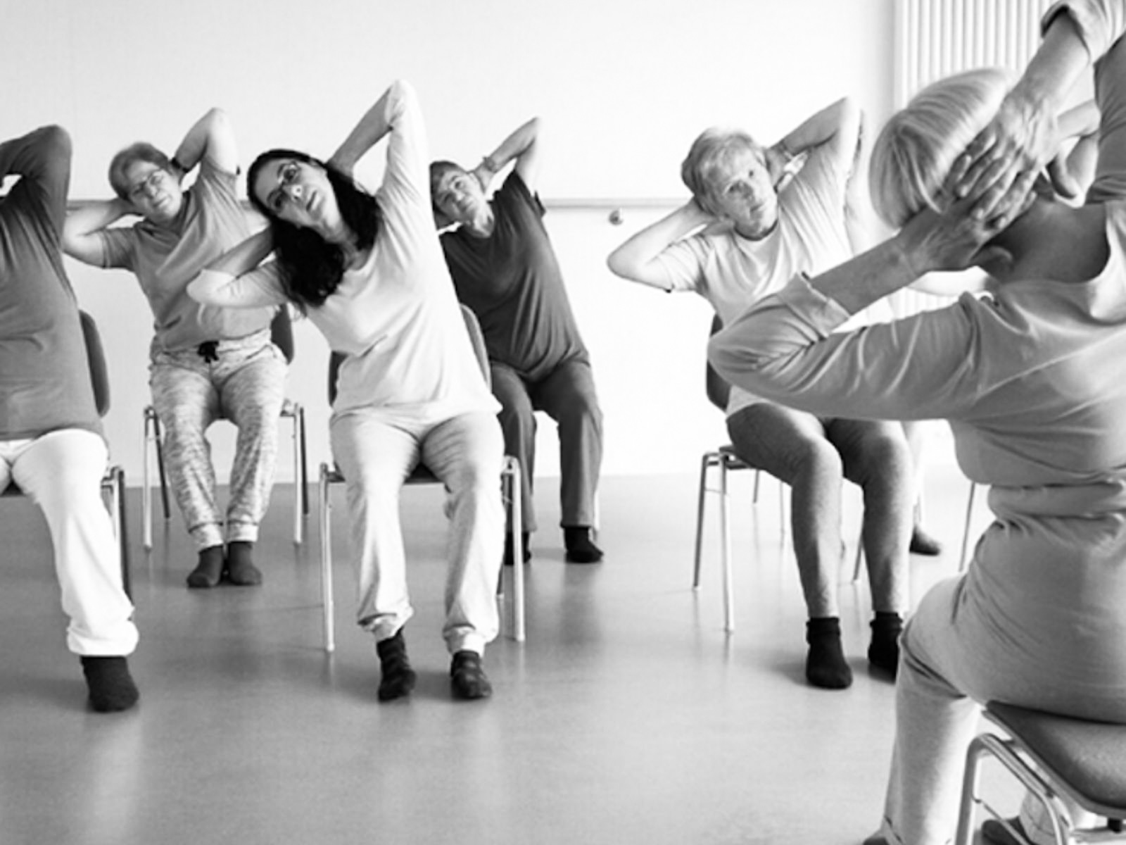 Seniors doing chair yoga, Chair Yoga Teacher Training