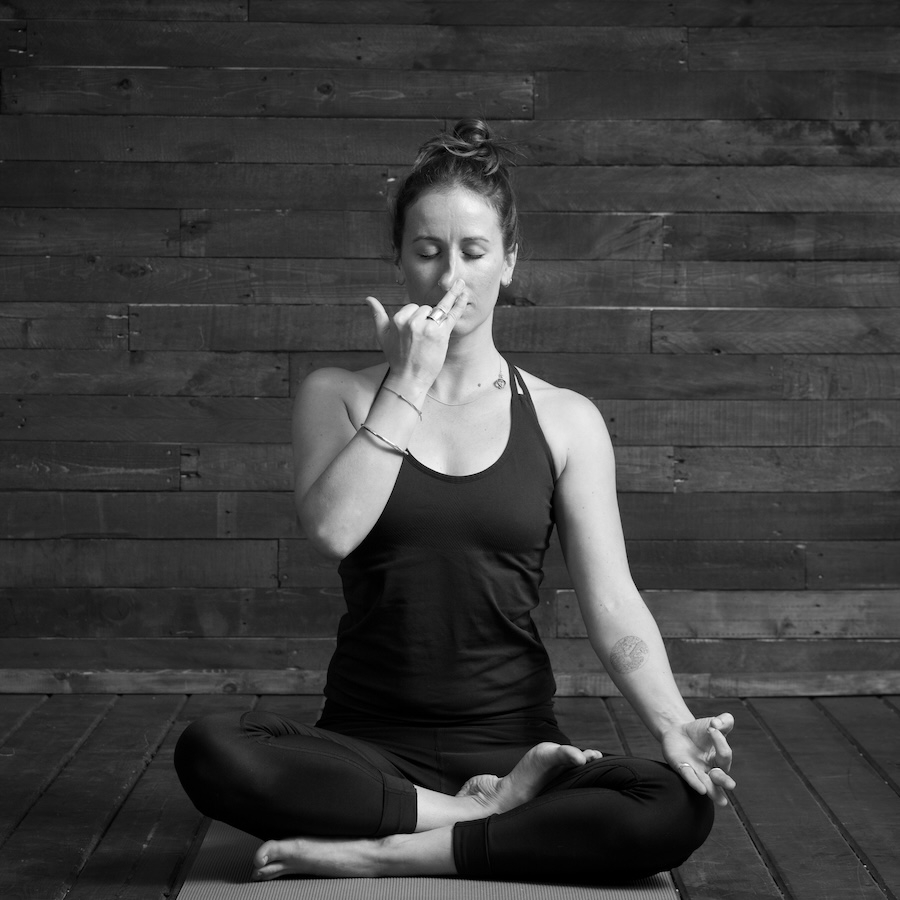 Ellie Grace using pranayama technique during her Trauma Informed Yoga Teacher Training session